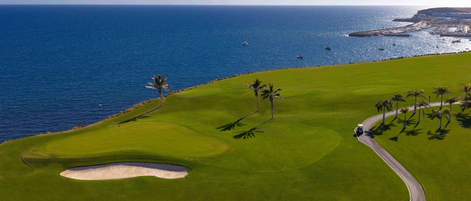 aerial view of meloneras golf and the coastline