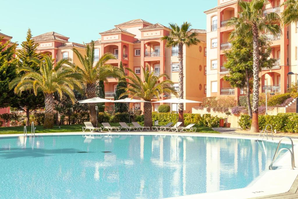 outside view of AMA islantilla Apartments in Costa de la luz, swimming pool